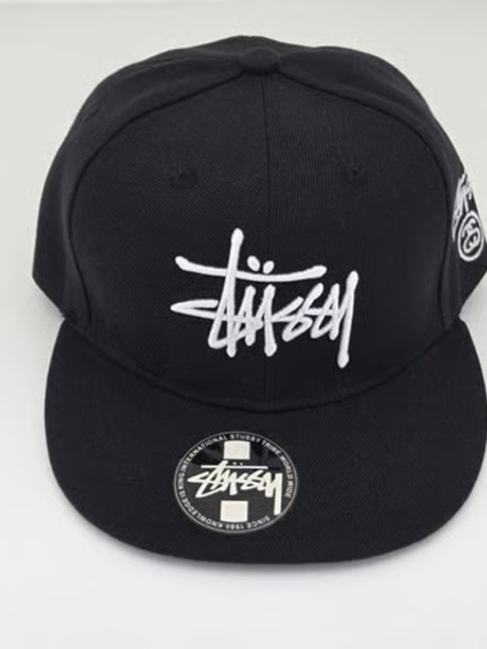 Stussy Black Snapback with White Script Logo